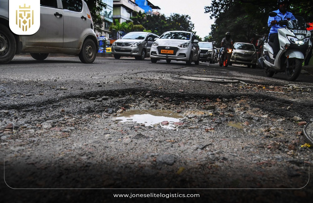 image of broken roads causing traffic | JEL