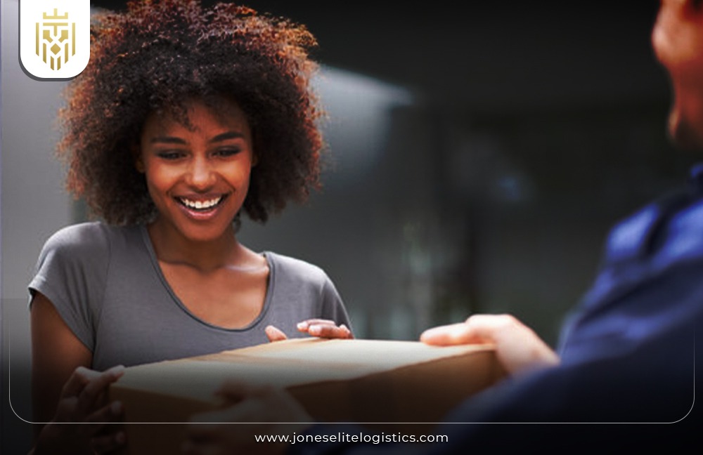 Image of a customer happily recieveing their order | JEL